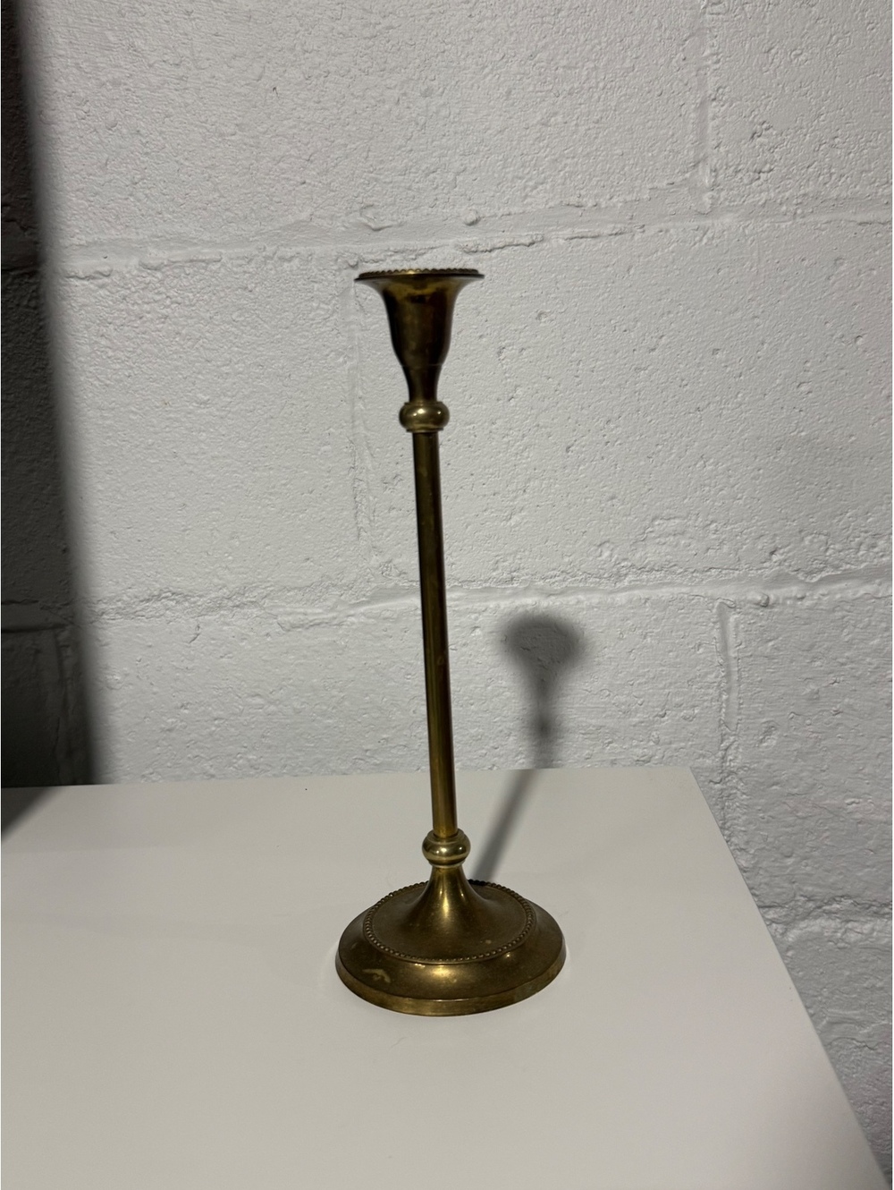 Vintage brass tall delicate beaded rim candlestick